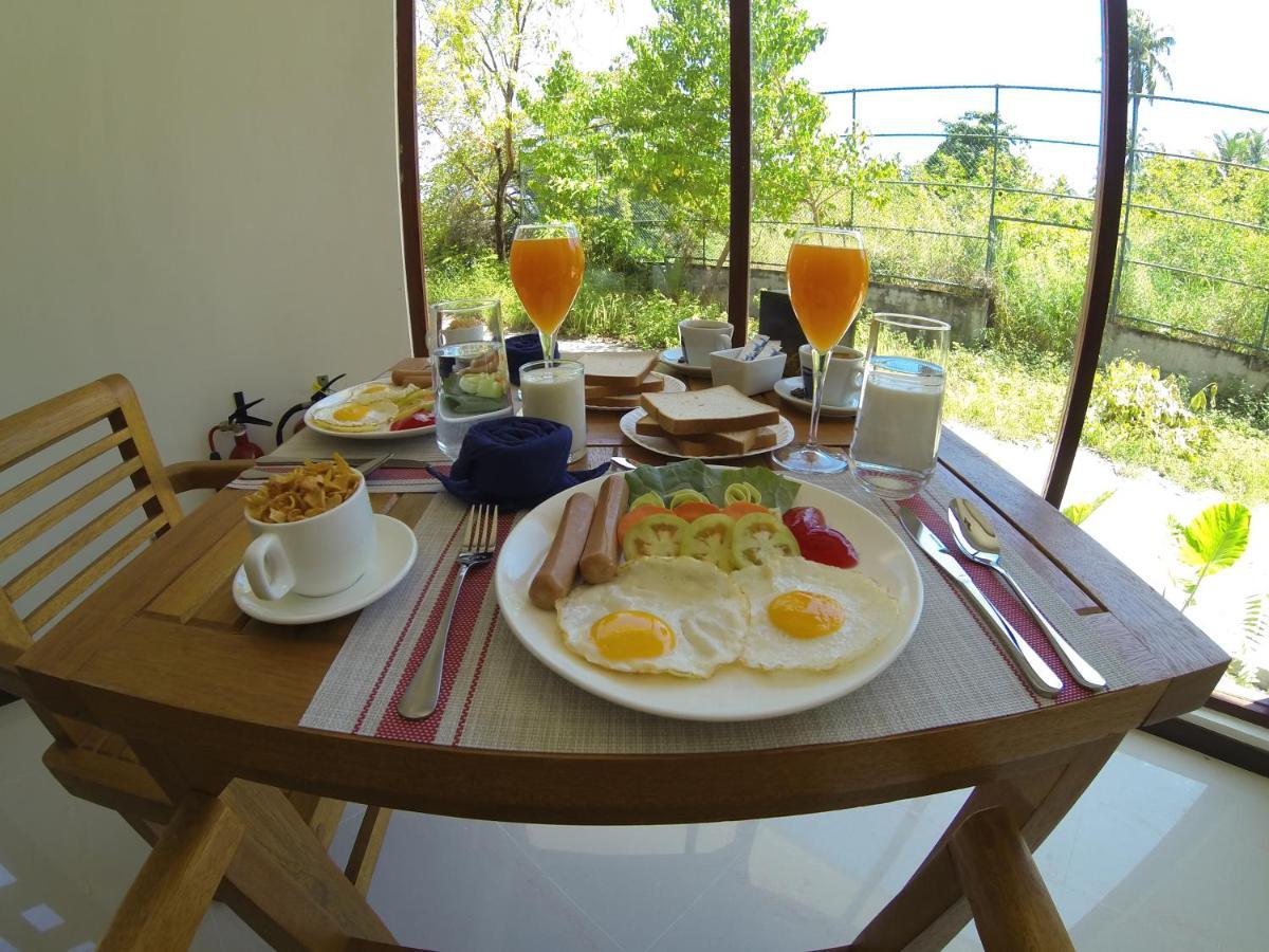 דהיגורה Grand Beach Dhigurah מראה חיצוני תמונה